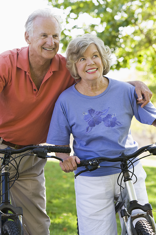 A couple riding their bicycles